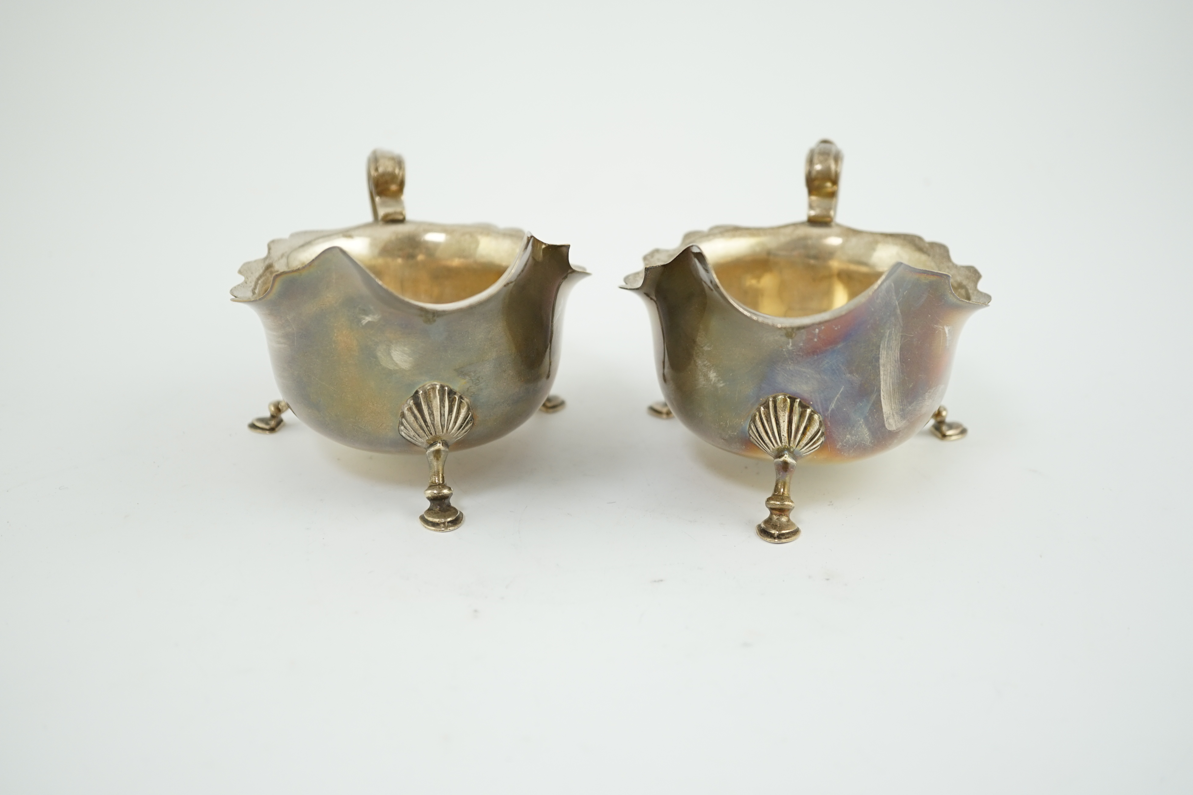 A pair of Elizabeth II silver sauce boats, maker A over HA